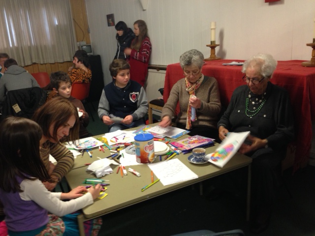 Adults on the children's paint table